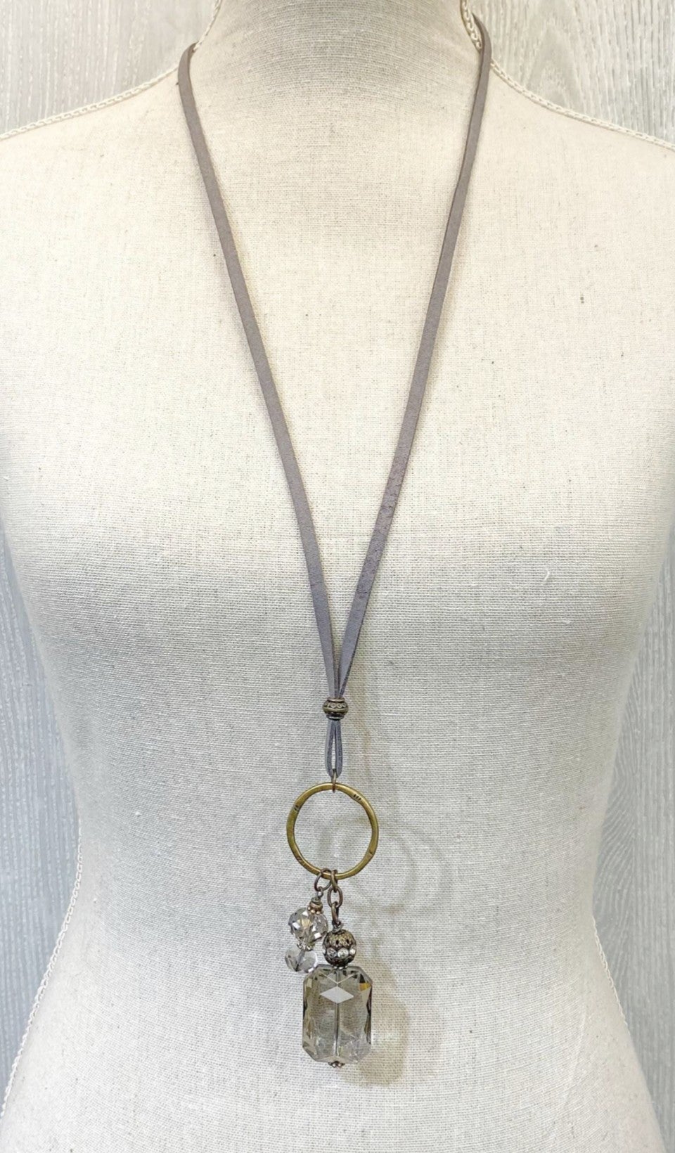 Grey leather necklace with stones