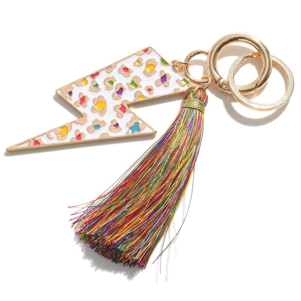 Gold Tone and Enamel Leopard Print Lightning Bolt Keychain Featuring Tassel Accent