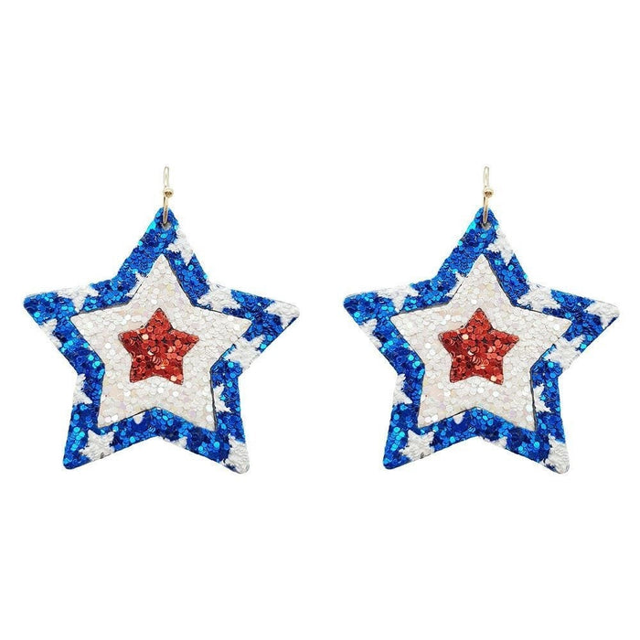 Glittered star earrings *Final Sale*